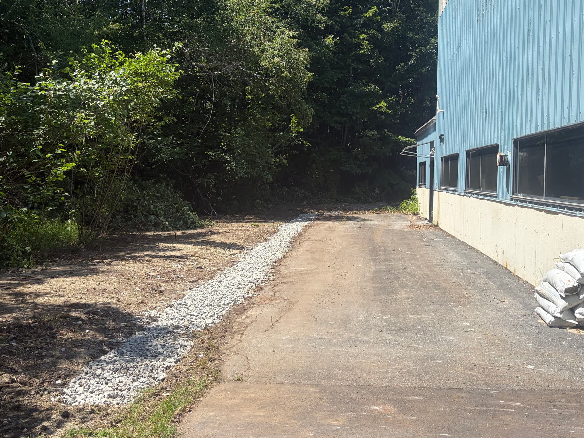 Gallery photos for French Drain Installation at a Commercial Building in Fitchburg: Image #1