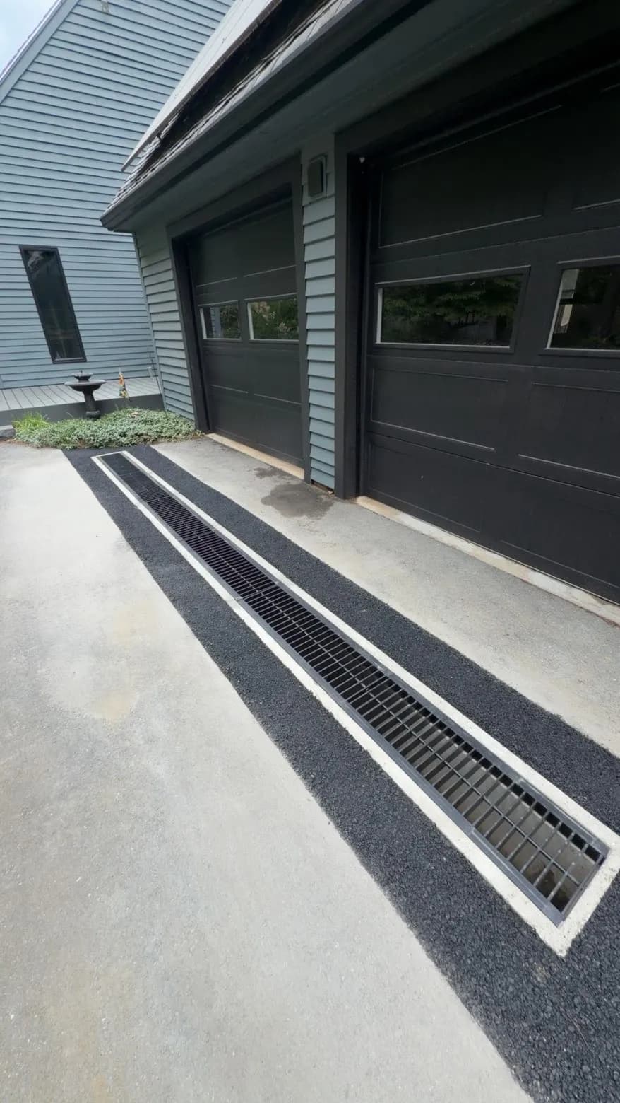Gallery photos for Trench Drain Install That Stops Water at the Garage Door: Image #1