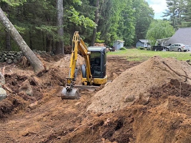 Efficient Driveway Preparation in Action image